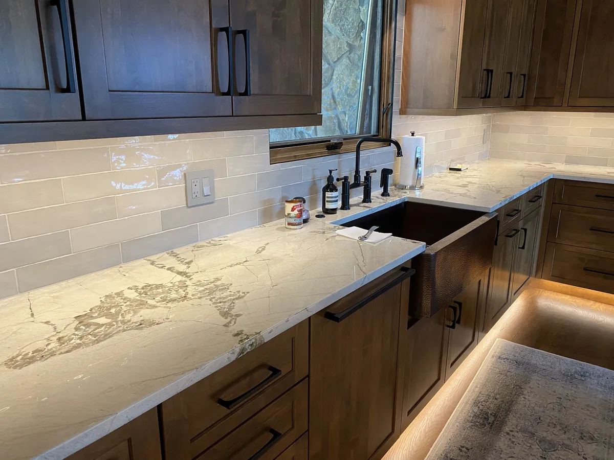 Kitchen with LED light under the upper cabinets and along the toe kick